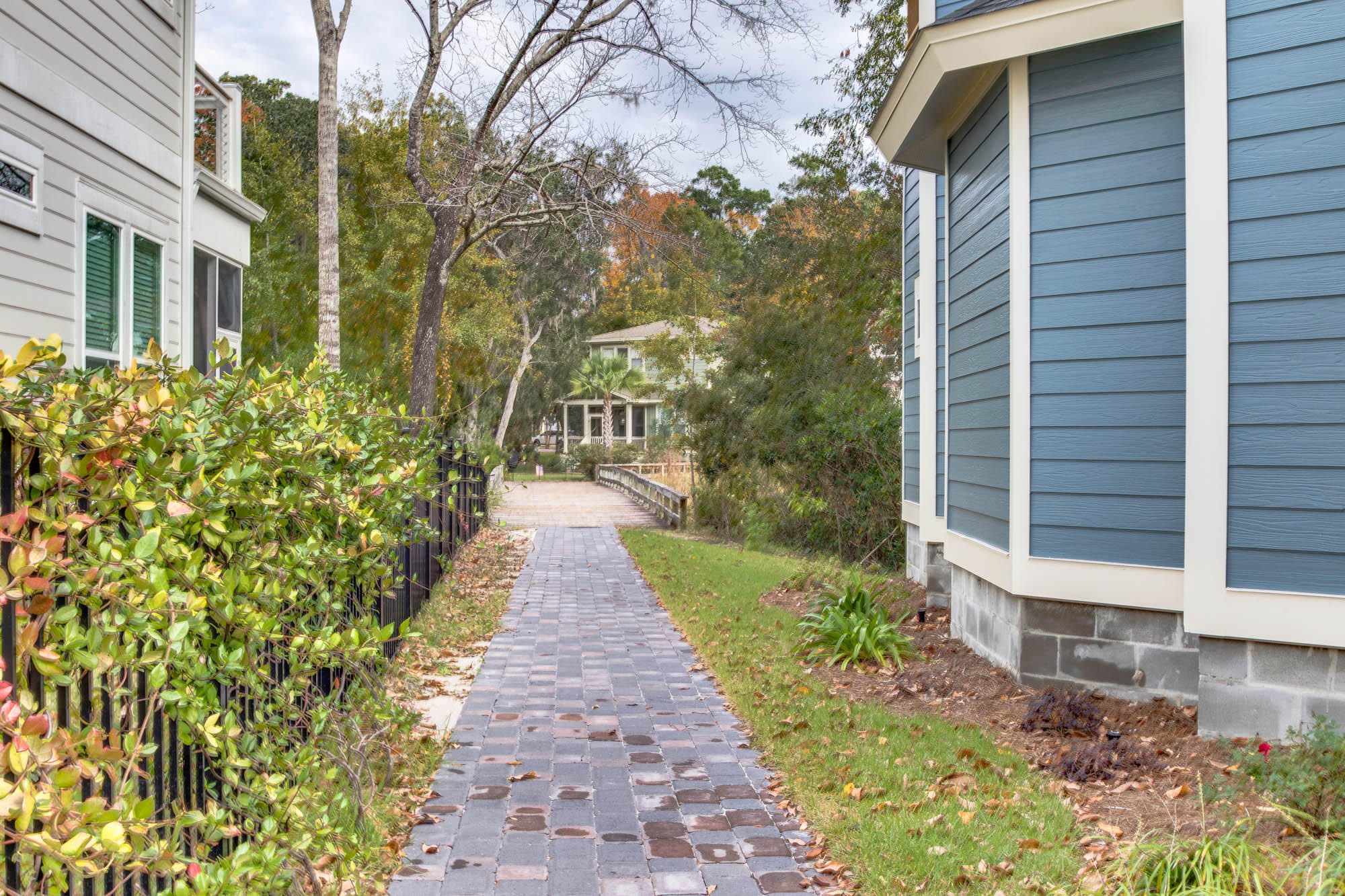 148 Rearden Way Santa Rosa Beach, FL 32459 - Photo 38 of 43 a view of a pathway with house on both side