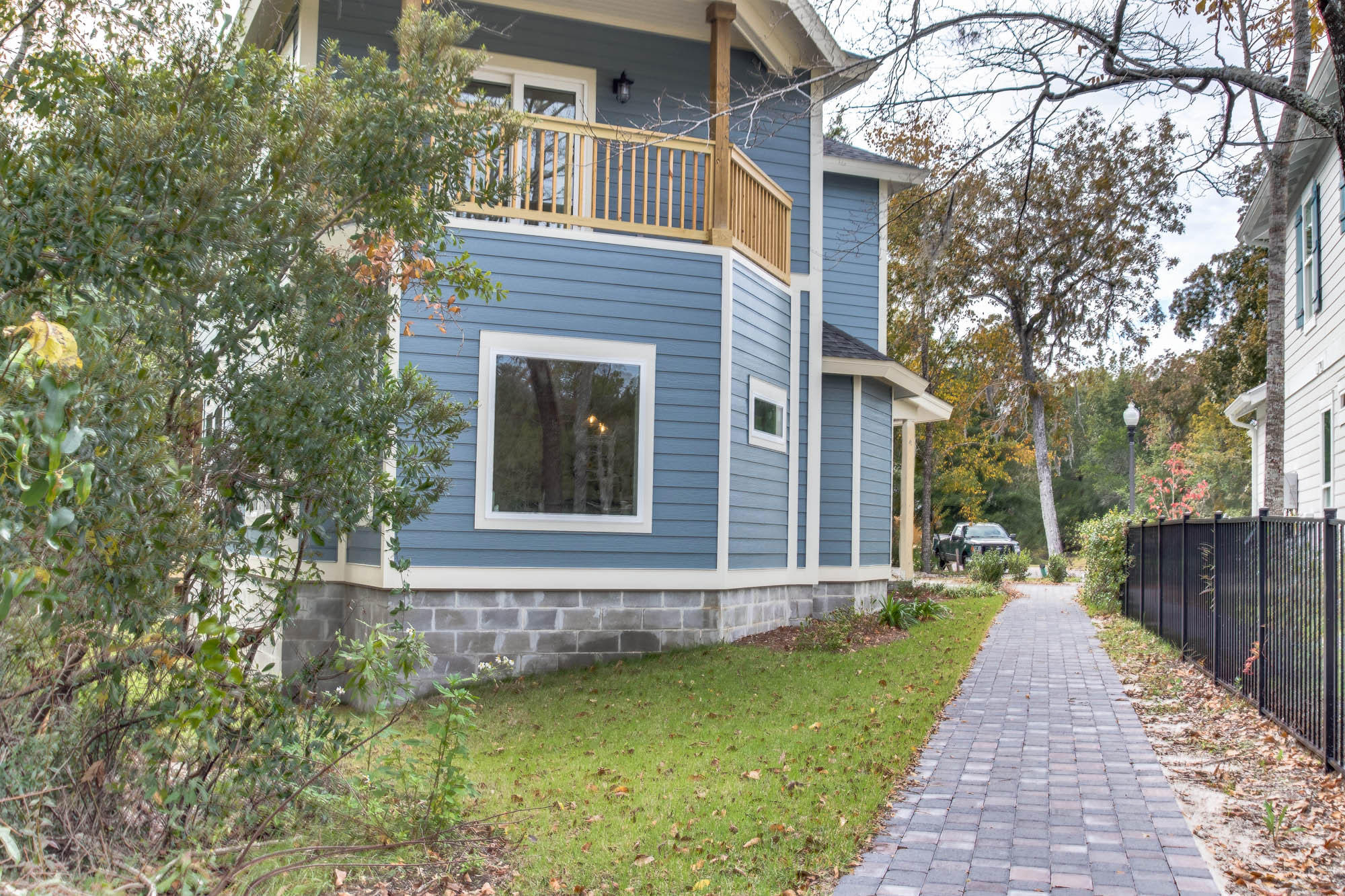 148 Rearden Way Santa Rosa Beach, FL 32459 - Photo 4 of 43 a front view of a house with a yard and trees