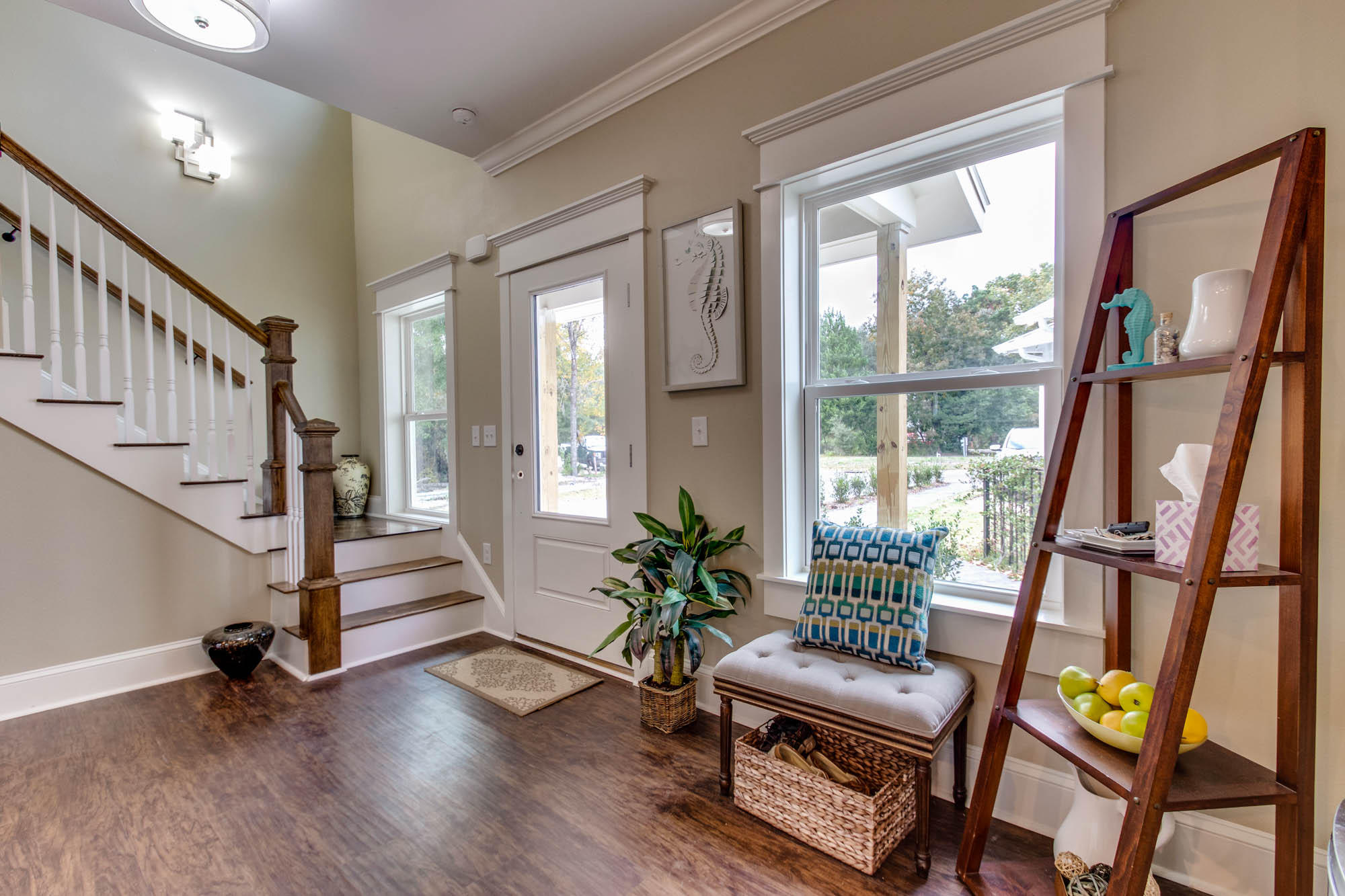 148 Rearden Way Santa Rosa Beach, FL 32459 - Photo 6 of 43 a living room with furniture and a wooden floor next to a window