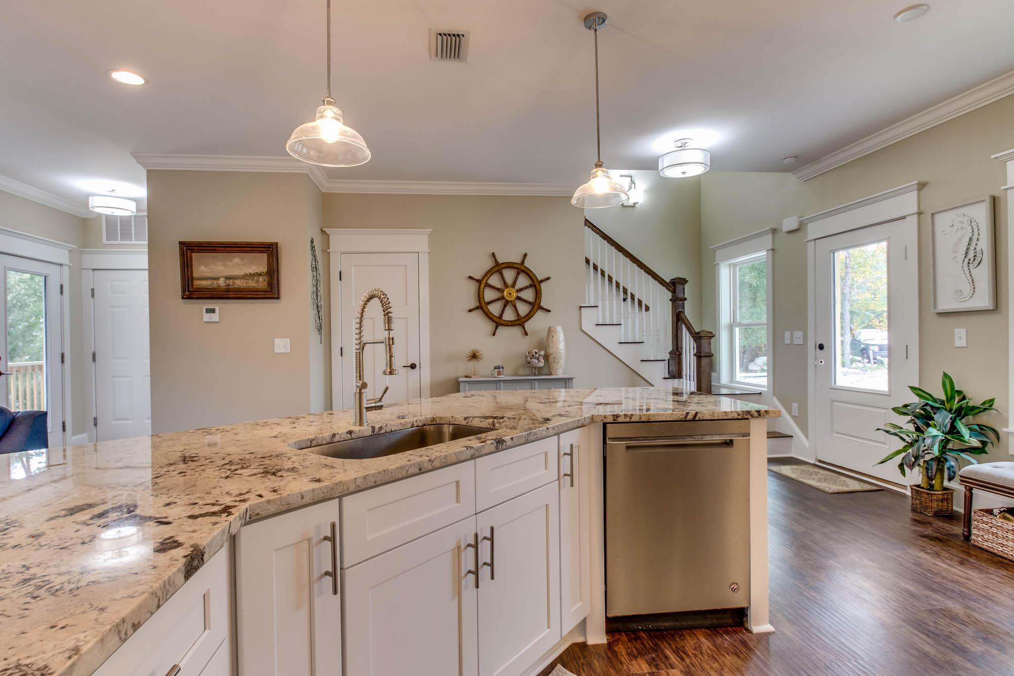 148 Rearden Way Santa Rosa Beach, FL 32459 - Photo 7 of 43 a kitchen with a sink a counter space and wooden floor