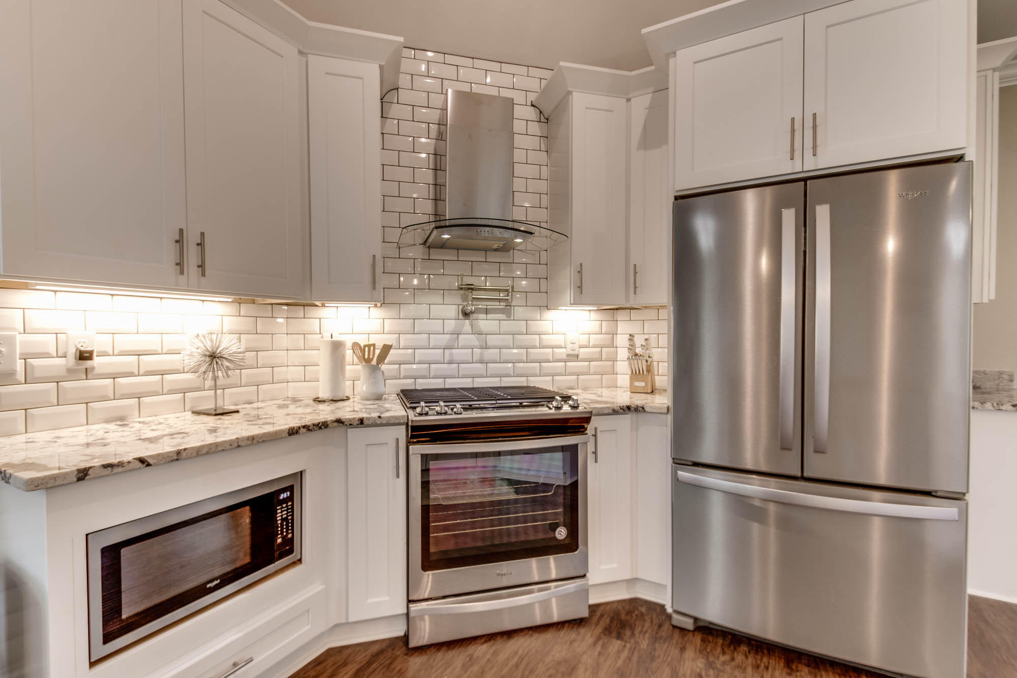148 Rearden Way Santa Rosa Beach, FL 32459 - Photo 8 of 43 a kitchen with stainless steel appliances granite countertop a refrigerator and a stove top oven