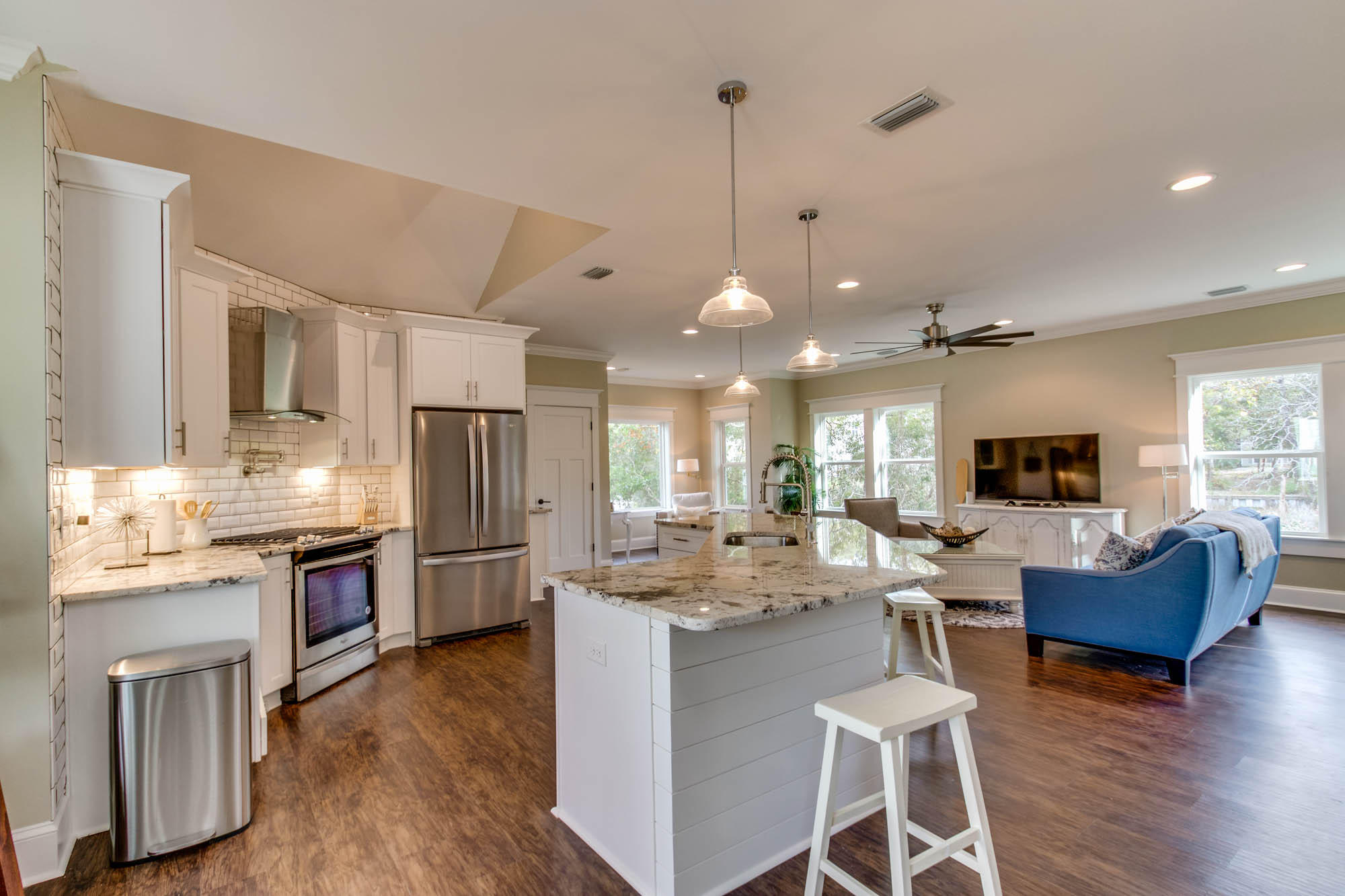 148 Rearden Way Santa Rosa Beach, FL 32459 - Photo 10 of 43 a living room with stainless steel appliances furniture or kitchen view and a wooden floor