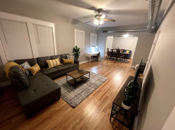 217 Des Plaines Avenue, Unit 1 Forest Park, IL 60130 - Photo 4 of 15 a living room with furniture and wooden floor