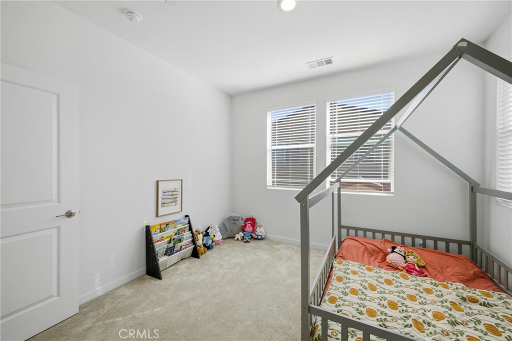 32736 Brunello Way Temecula, CA 92591 - Photo 14 of 75 a bed room with furniture and a window