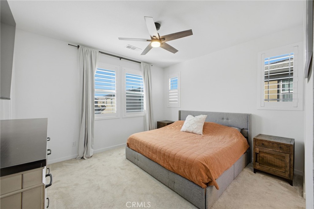 32736 Brunello Way Temecula, CA 92591 - Photo 24 of 75 a bedroom with a bed and a window