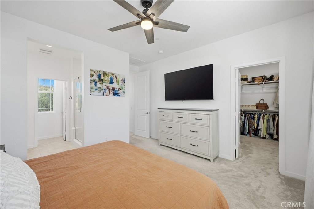 32736 Brunello Way Temecula, CA 92591 - Photo 26 of 75 a bedroom with a bed and a flat screen tv