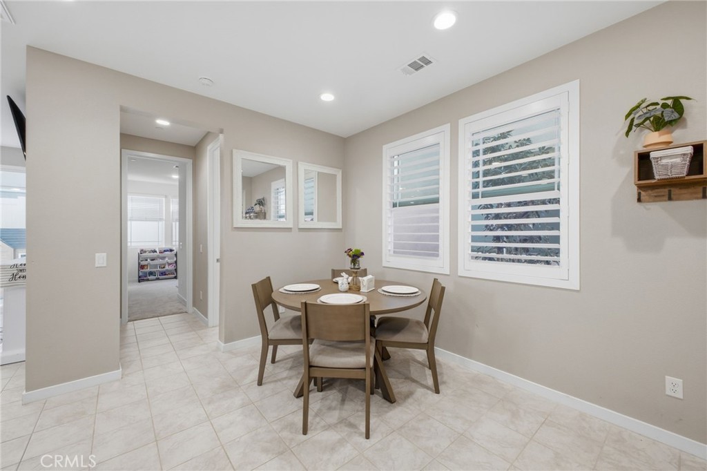 32736 Brunello Way Temecula, CA 92591 - Photo 36 of 75 a view of a dining room with furniture and window