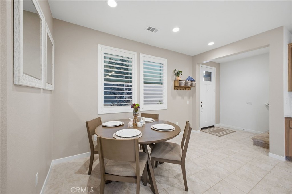 32736 Brunello Way Temecula, CA 92591 - Photo 37 of 75 a view of a dining room with furniture and window