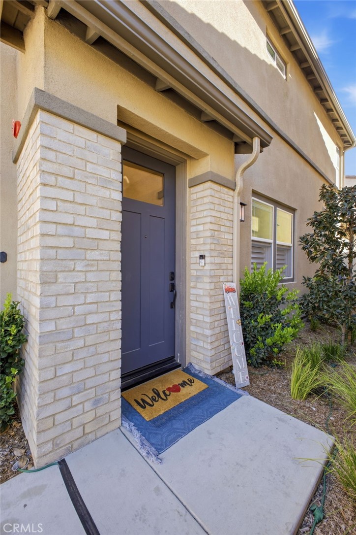 32736 Brunello Way Temecula, CA 92591 - Photo 5 of 75 a front view of a house with garden