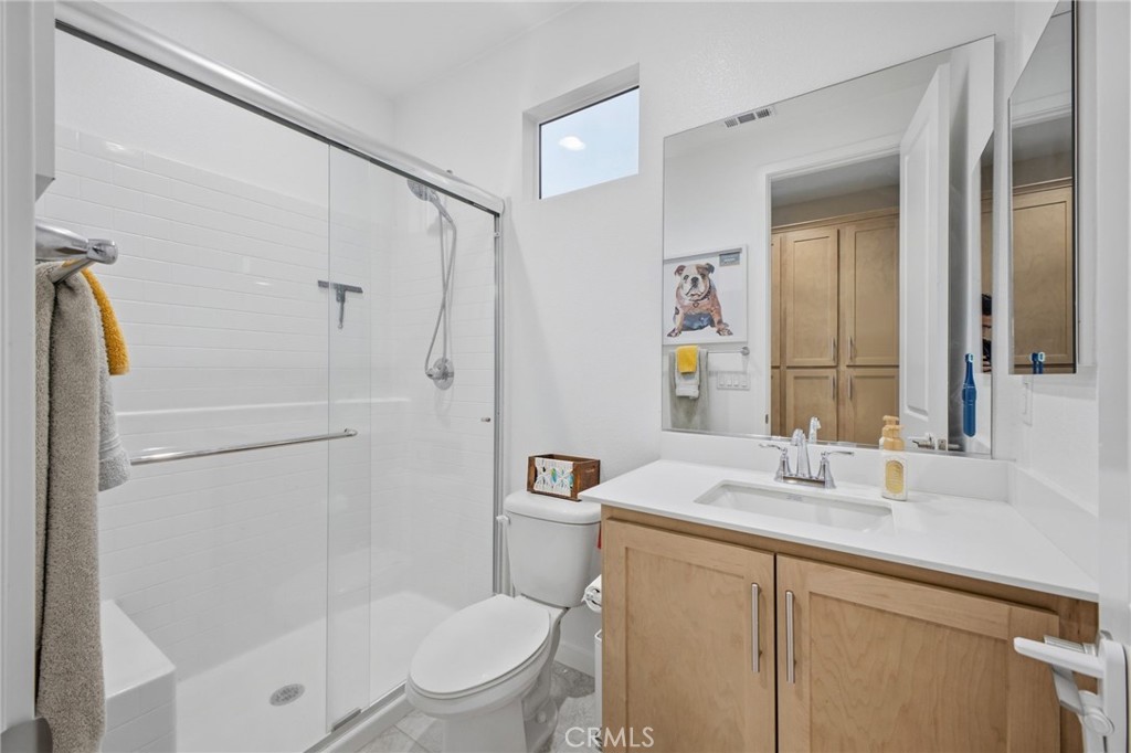 32736 Brunello Way Temecula, CA 92591 - Photo 53 of 75 a bathroom with a granite countertop sink toilet and shower