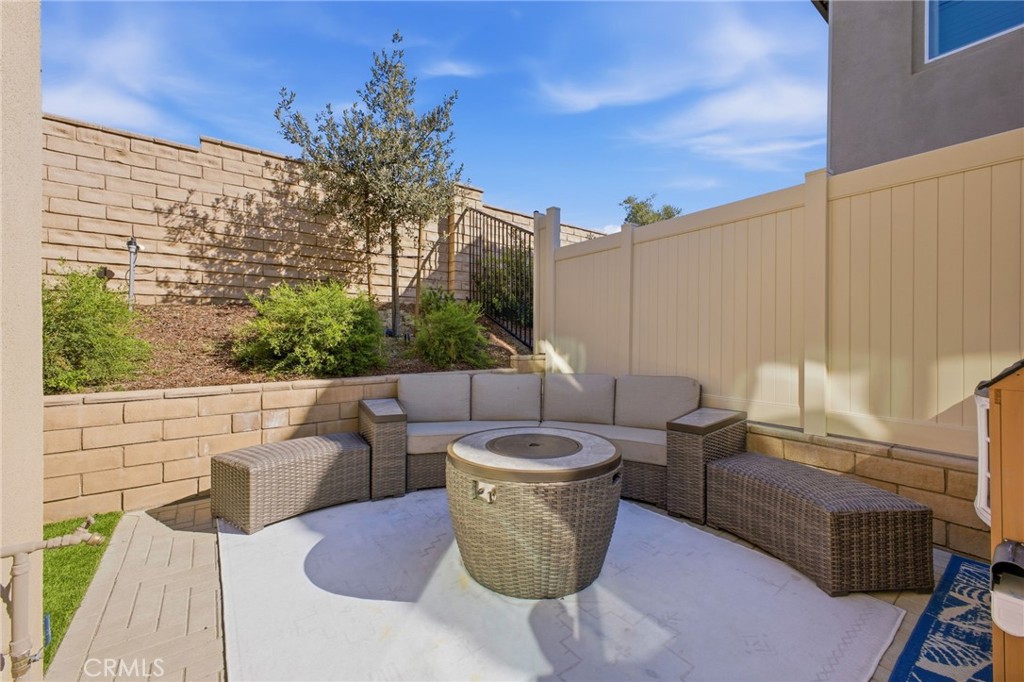 32736 Brunello Way Temecula, CA 92591 - Photo 57 of 75 a view of a balcony with table and chairs and potted plants