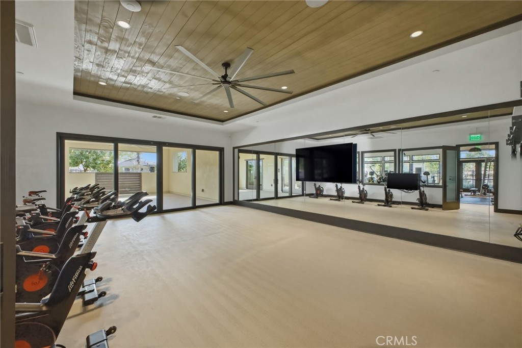 32736 Brunello Way Temecula, CA 92591 - Photo 65 of 75 a view of a livingroom with furniture and floor to ceiling window