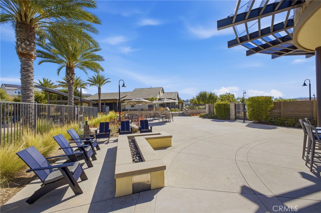 32736 Brunello Way Temecula, CA 92591 - Photo 70 of 75 a view of a lake with couches chairs
