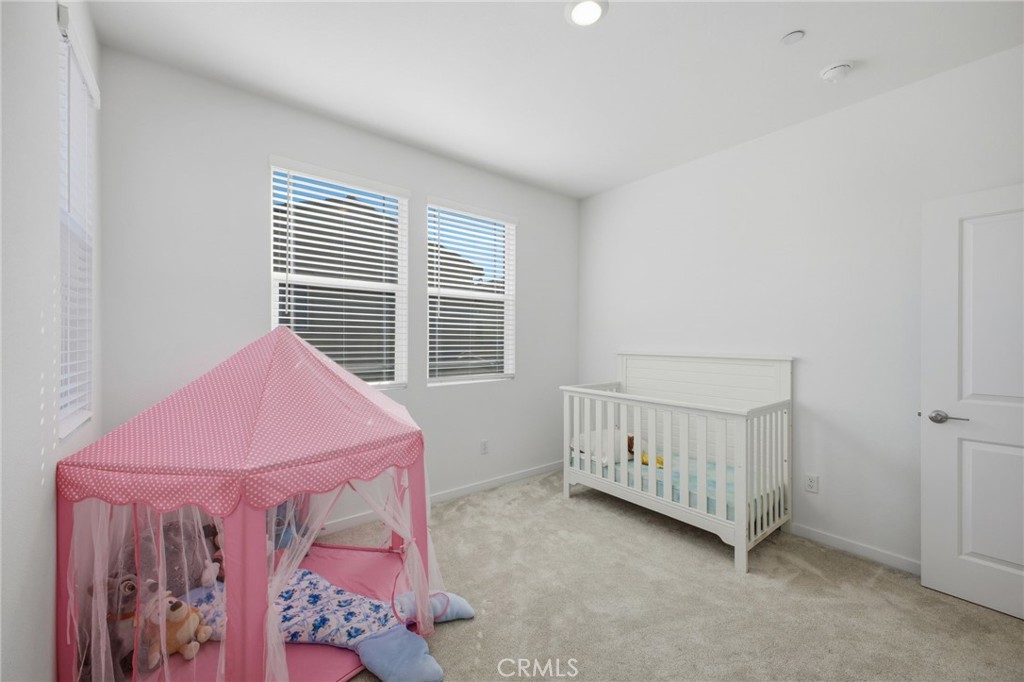 32736 Brunello Way Temecula, CA 92591 - Photo 10 of 75 a view of a room that has a bed and a window
