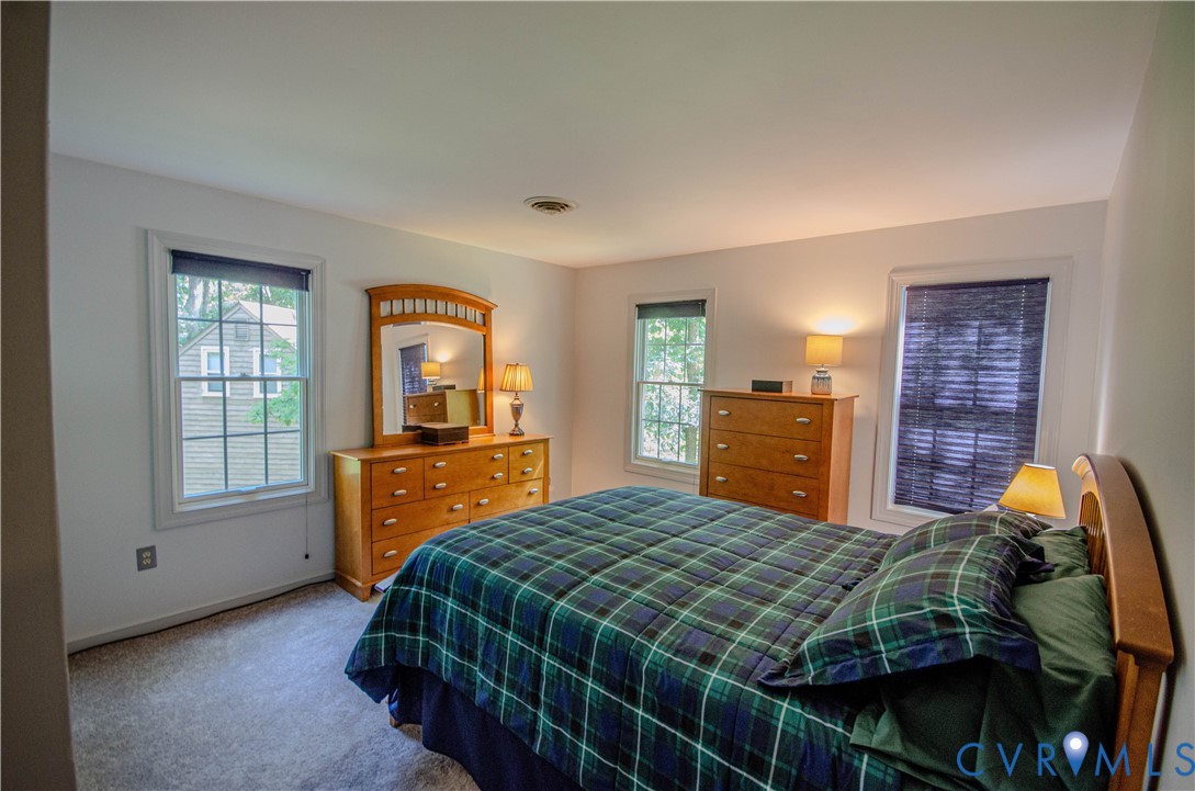 12500 Musical Lane Midlothian, VA 23113 - Photo 31 of 51 Carpeted bedroom featuring multiple windows with b