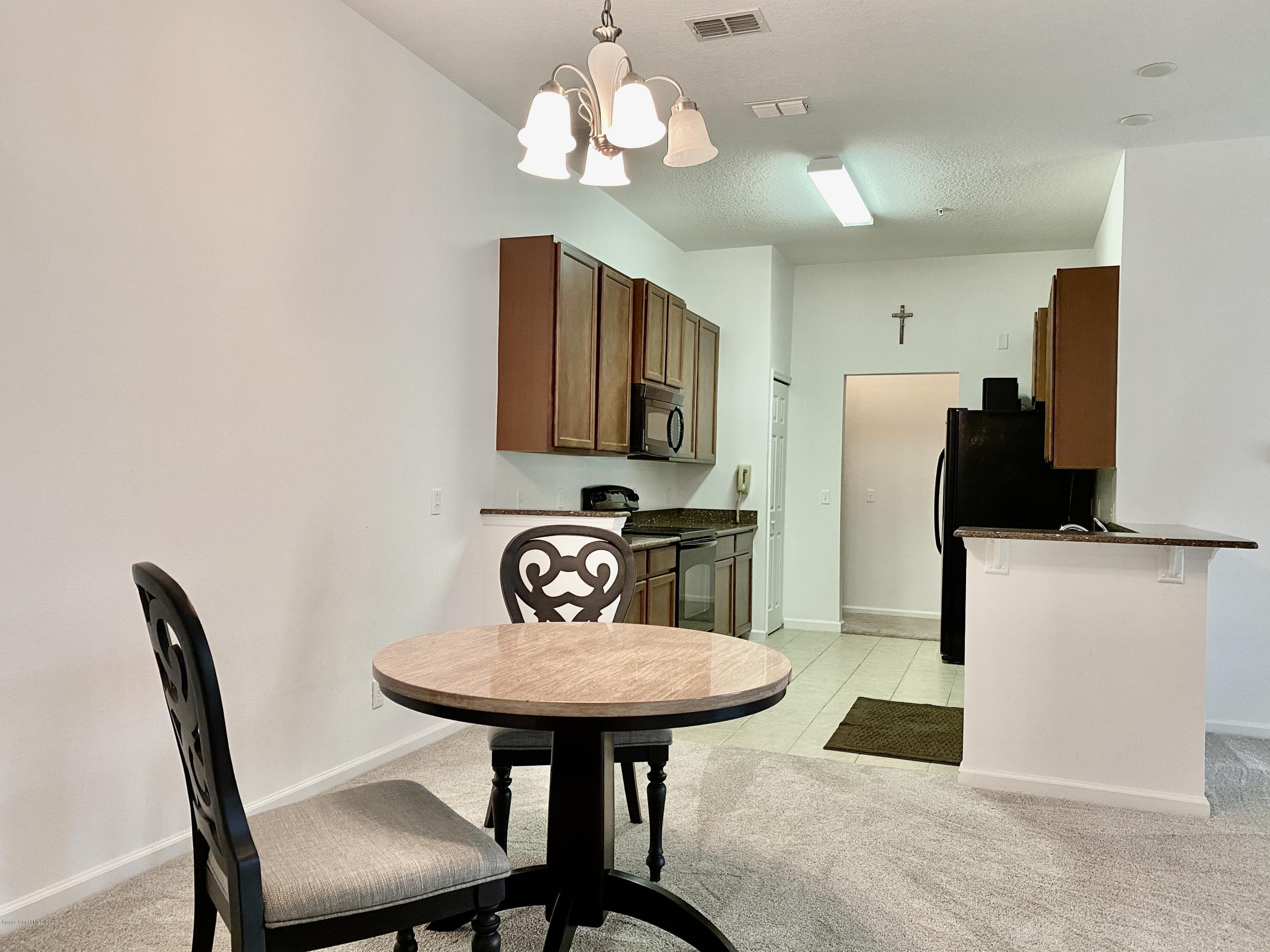4026 Meander Place, Unit 204 Rockledge, FL 32955 - Photo 3 of 25 7BB961FD-8902-49E3-8EAE-9D786C34ADF0_1_2