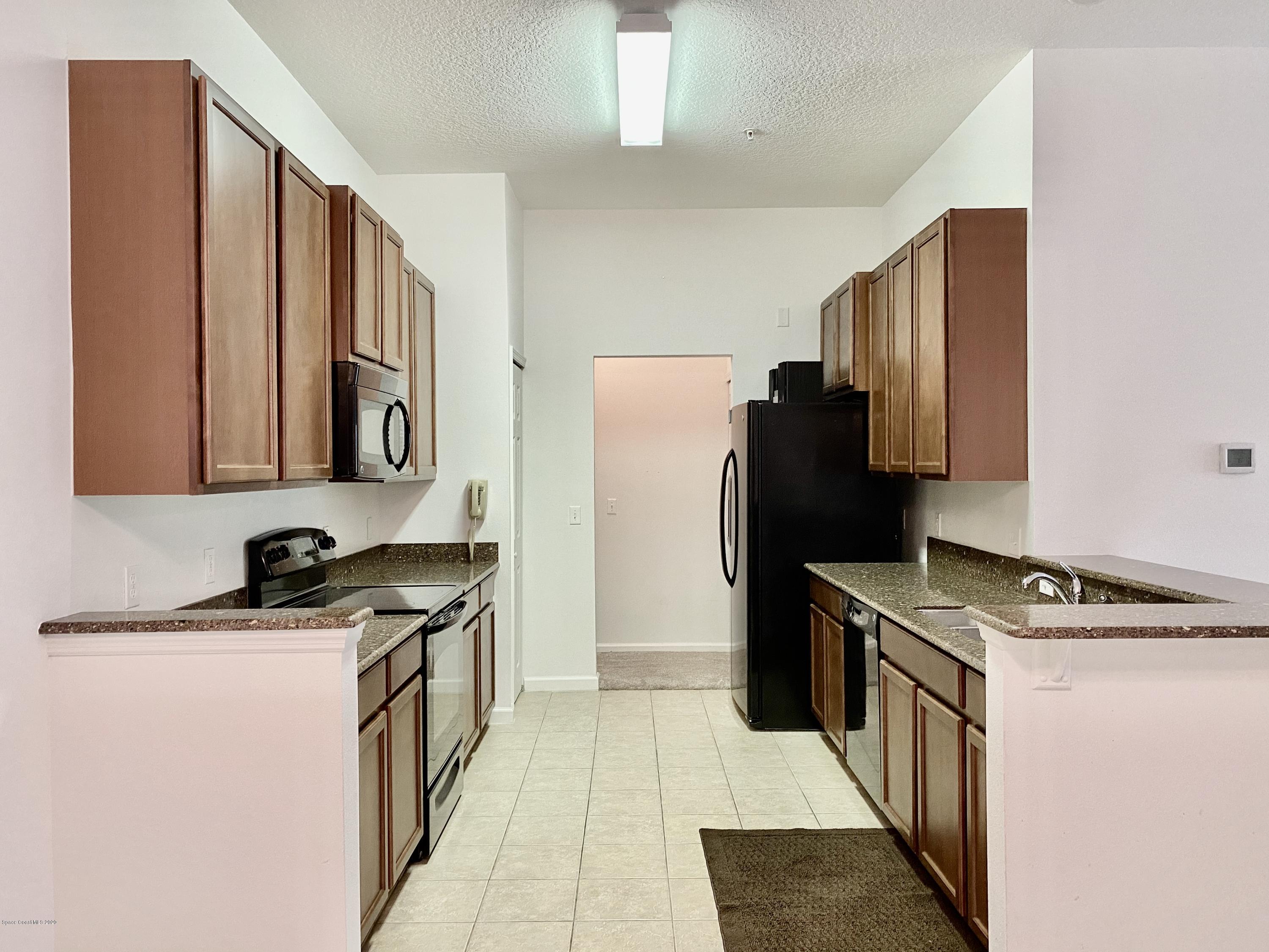 4026 Meander Place, Unit 204 Rockledge, FL 32955 - Photo 6 of 25 D5DF1D45-2471-4BC0-BCD4-C98C38E86AC0_1_2