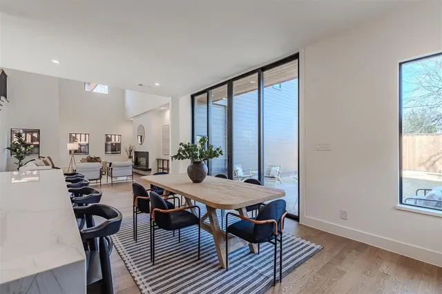 a view of a dining room with furniture and window