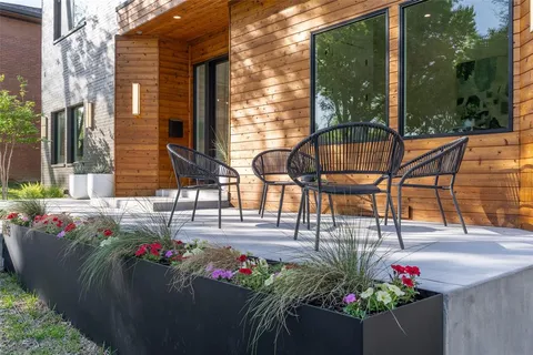 a view of a tables and chairs in the patio