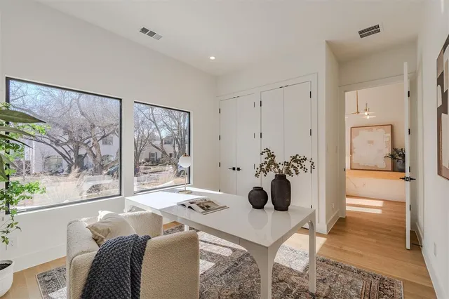 a view of a living room and dining room