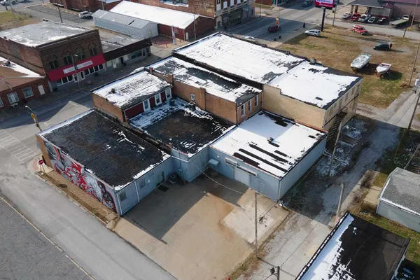 an aerial view of a roof deck with patio