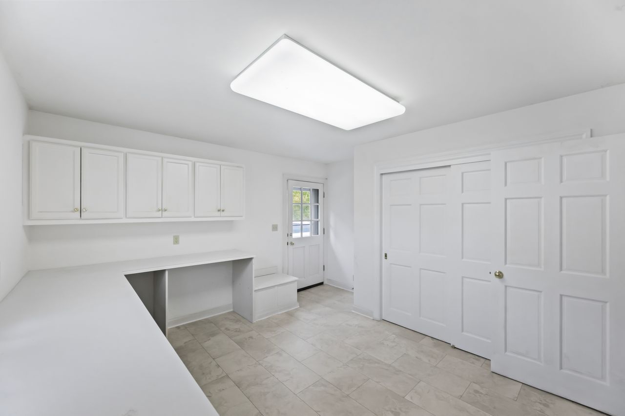 W312N4890 Chapel Ridge Road Merton, WI 53029 - Photo 19 of 30 Main Floor Laundry Room
