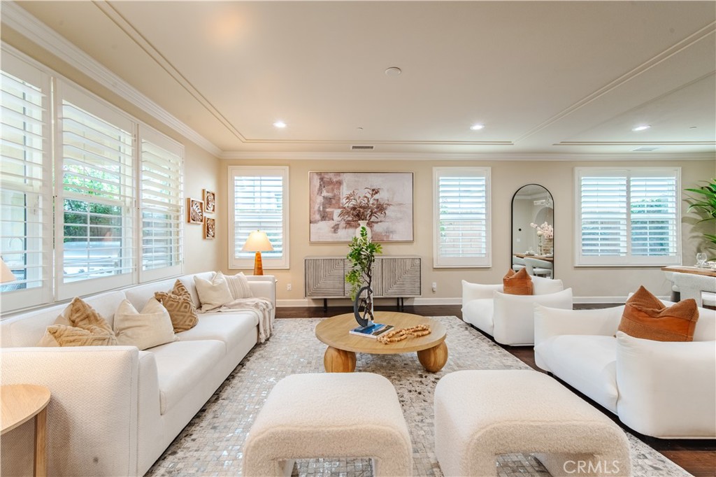 65 Rolling Irvine, CA 92620 - Photo 13 of 54 a living room with furniture and large windows