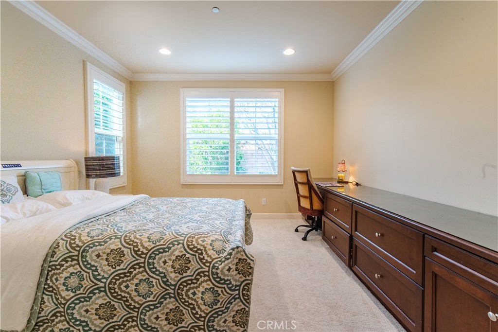 65 Rolling Irvine, CA 92620 - Photo 21 of 54 a bedroom with a bed and a window