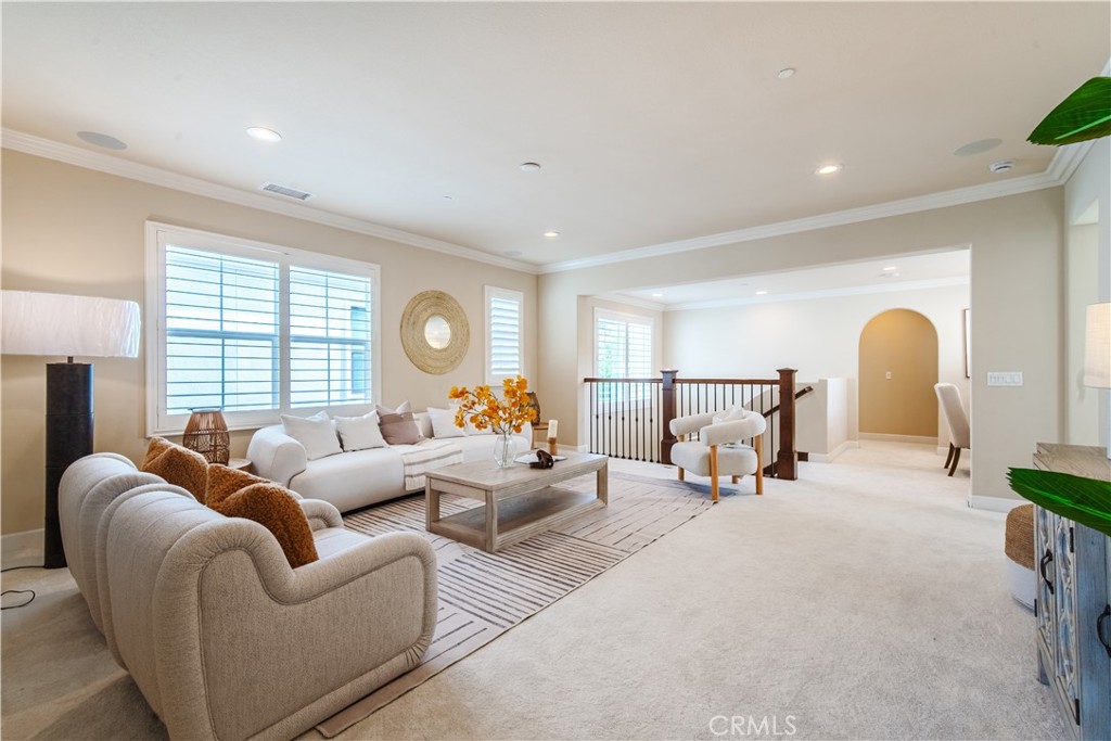 65 Rolling Irvine, CA 92620 - Photo 26 of 54 a living room with furniture and a large window