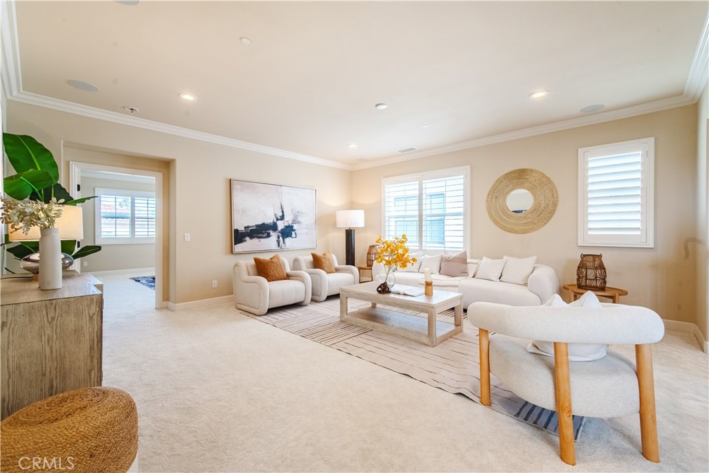 65 Rolling Irvine, CA 92620 - Photo 28 of 54 a living room with furniture and a large window