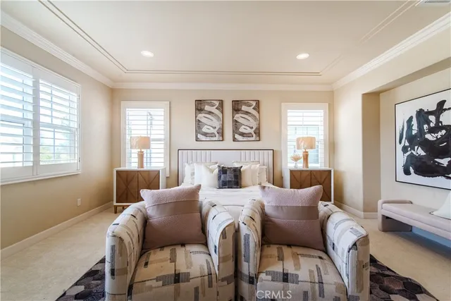 a spacious bathroom with a tub sink and a mirror