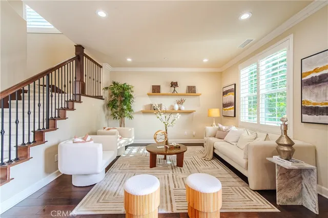 a living room with furniture and a table