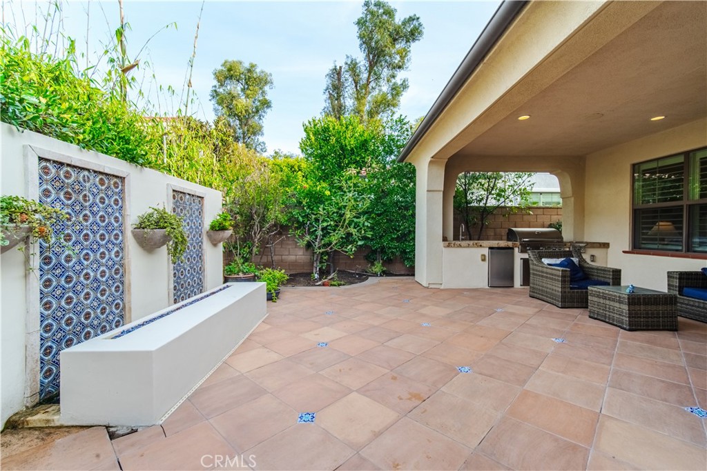 65 Rolling Irvine, CA 92620 - Photo 46 of 54 a view of a patio with couches and potted plants