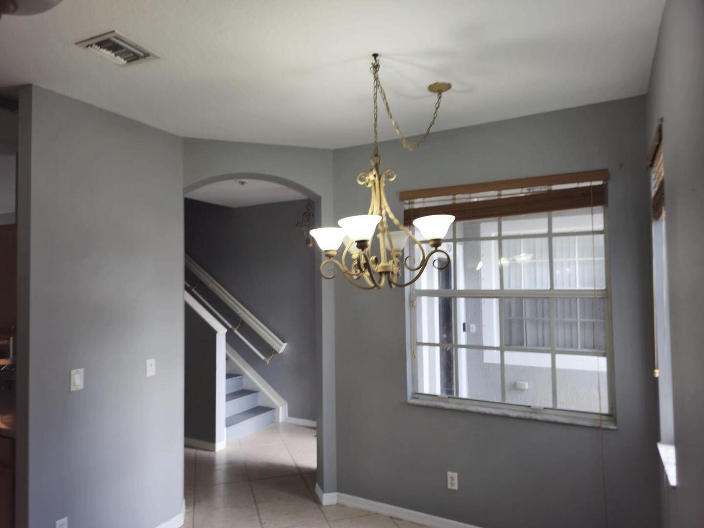 3123 Grandiflora Drive Greenacres, FL 33467 - Photo 12 of 49 a view of a livingroom with a staircase