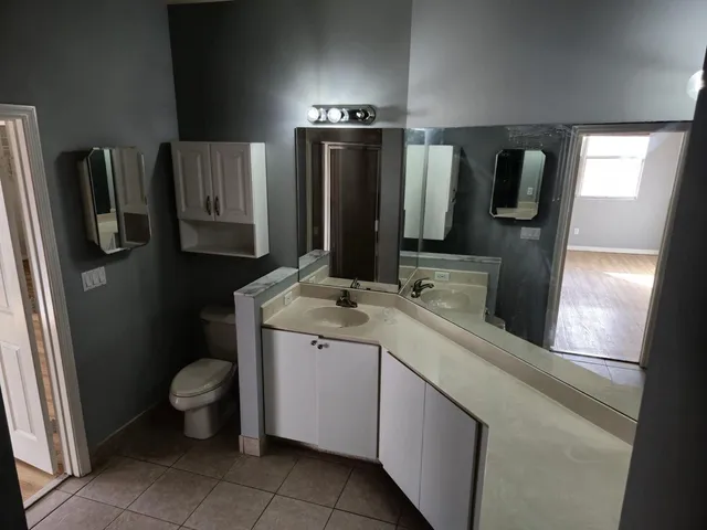 a bathroom with a glass door