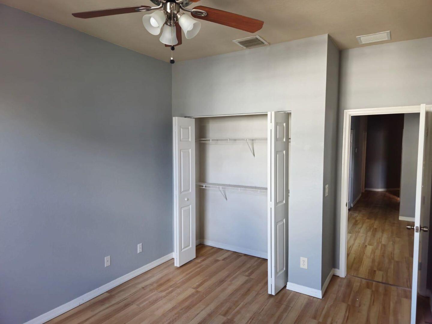 3123 Grandiflora Drive Greenacres, FL 33467 - Photo 37 of 49 a view of a room with wooden floor