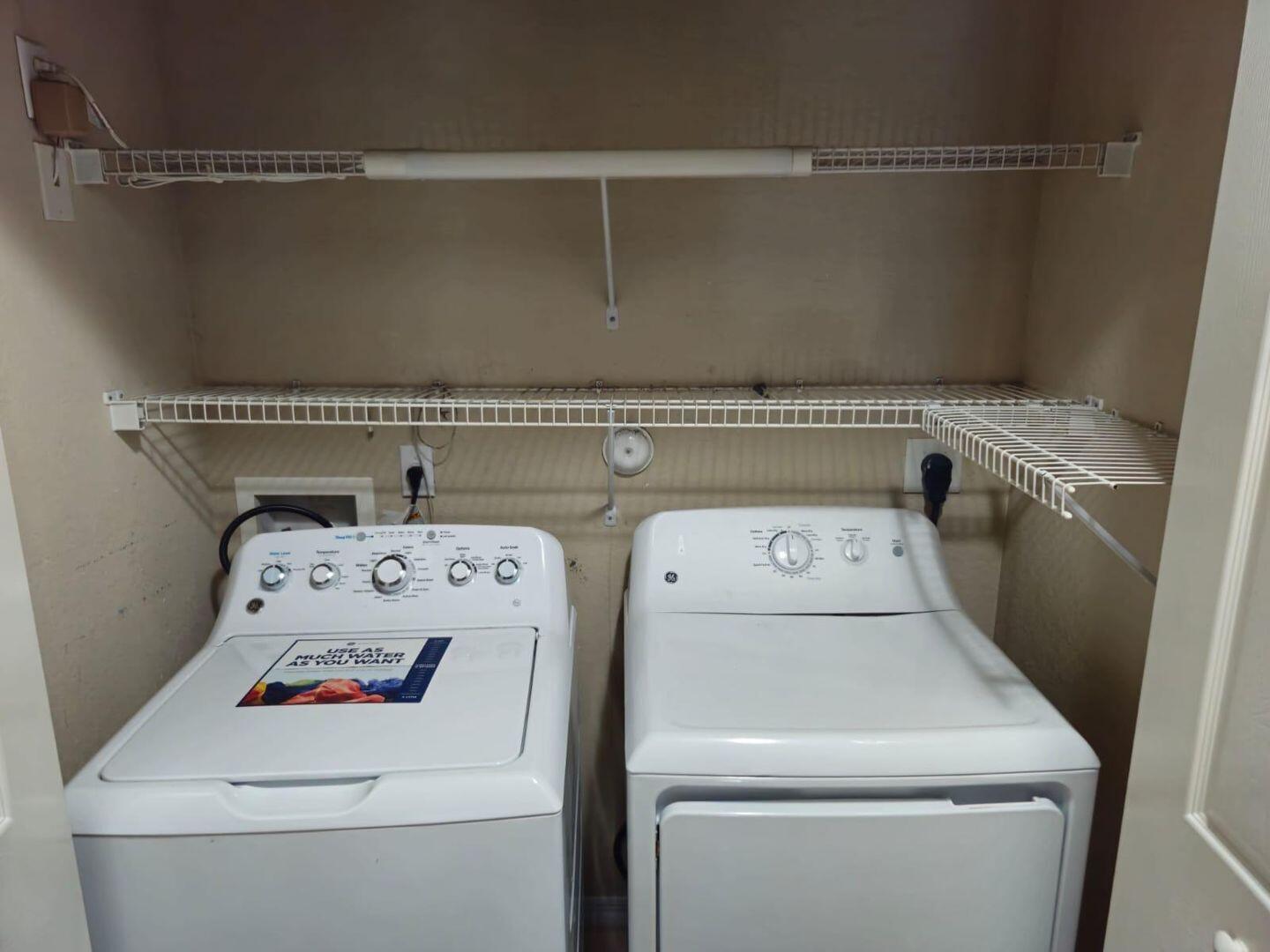 3123 Grandiflora Drive Greenacres, FL 33467 - Photo 42 of 49 a utility room with dryer and washer
