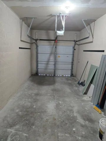 a view of house with backyard