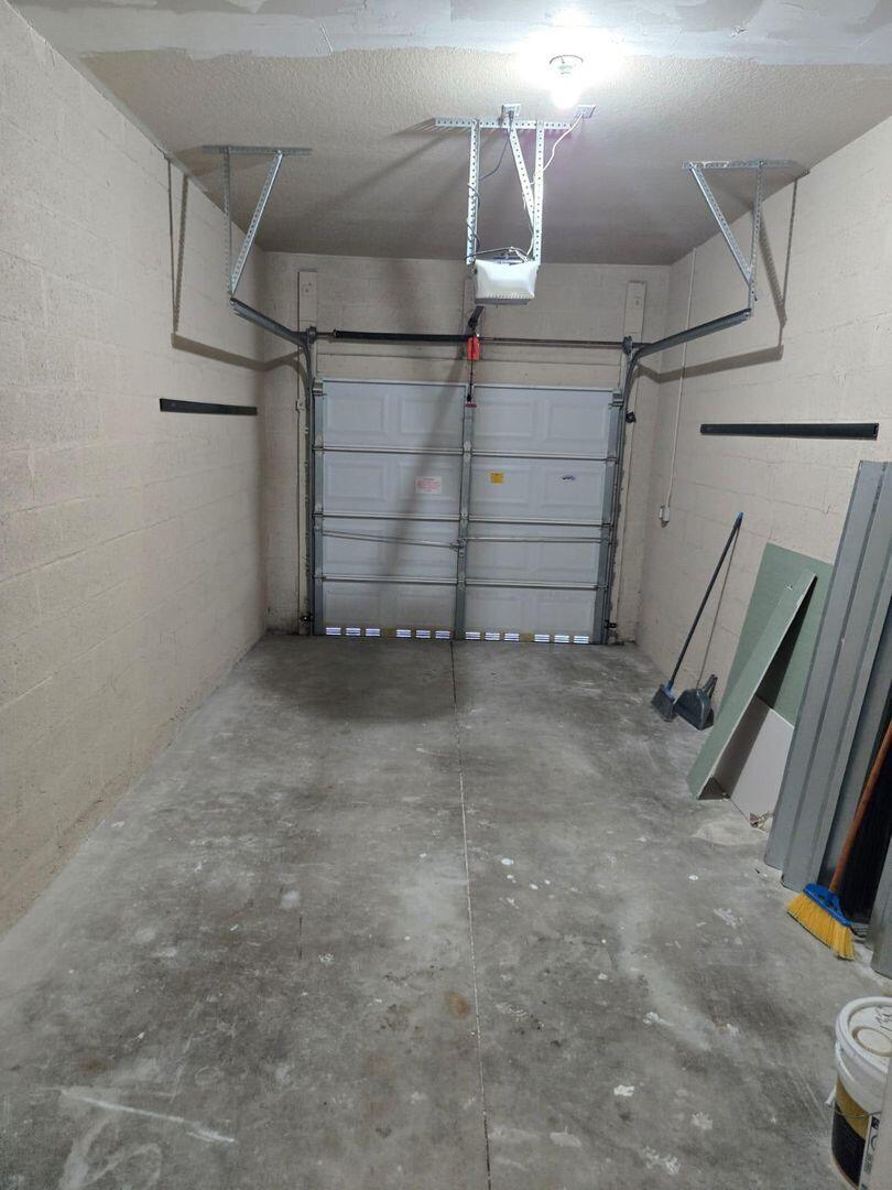 3123 Grandiflora Drive Greenacres, FL 33467 - Photo 43 of 49 a view of a garage