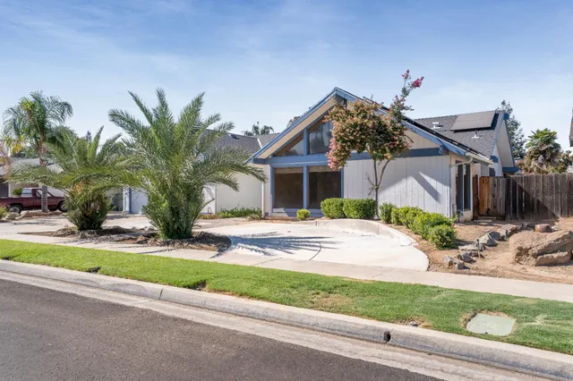 a bathroom with a sink a vanity and a mirror
