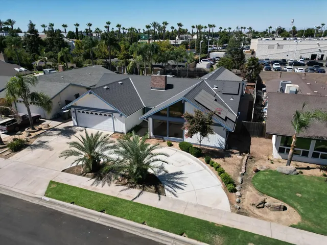 a view of a house with garden