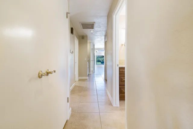 an aerial view of house with a yard