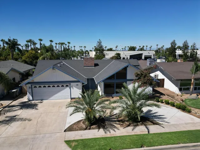 a view of a house with a street