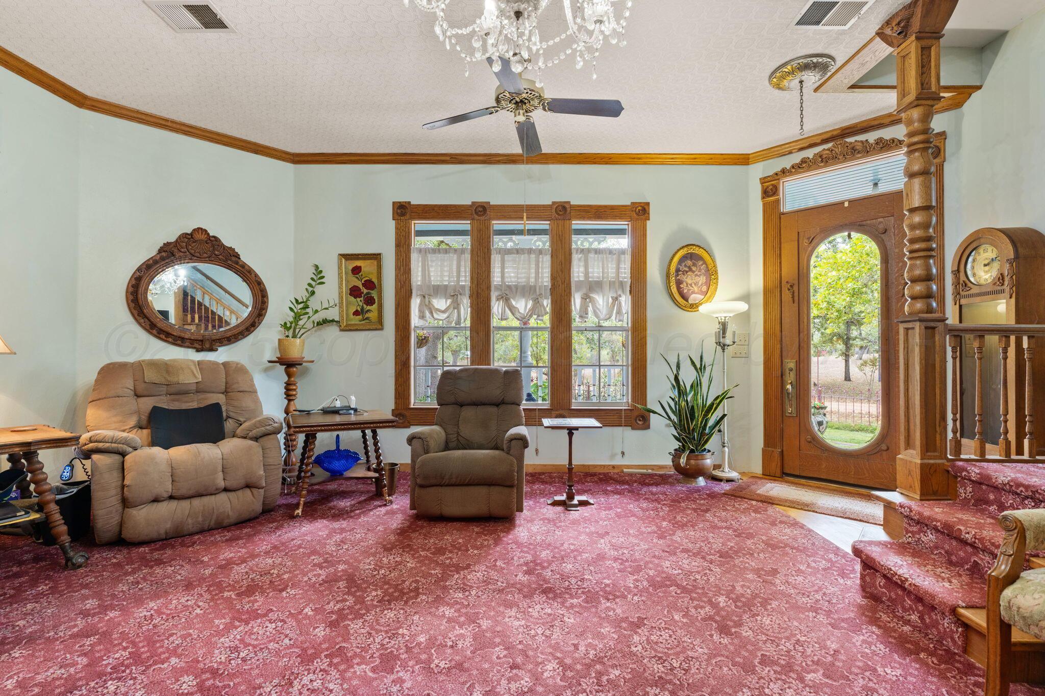 2403 Maple Lane Kingsland, TX 78639 - Photo 13 of 46 a living room with furniture and a large window