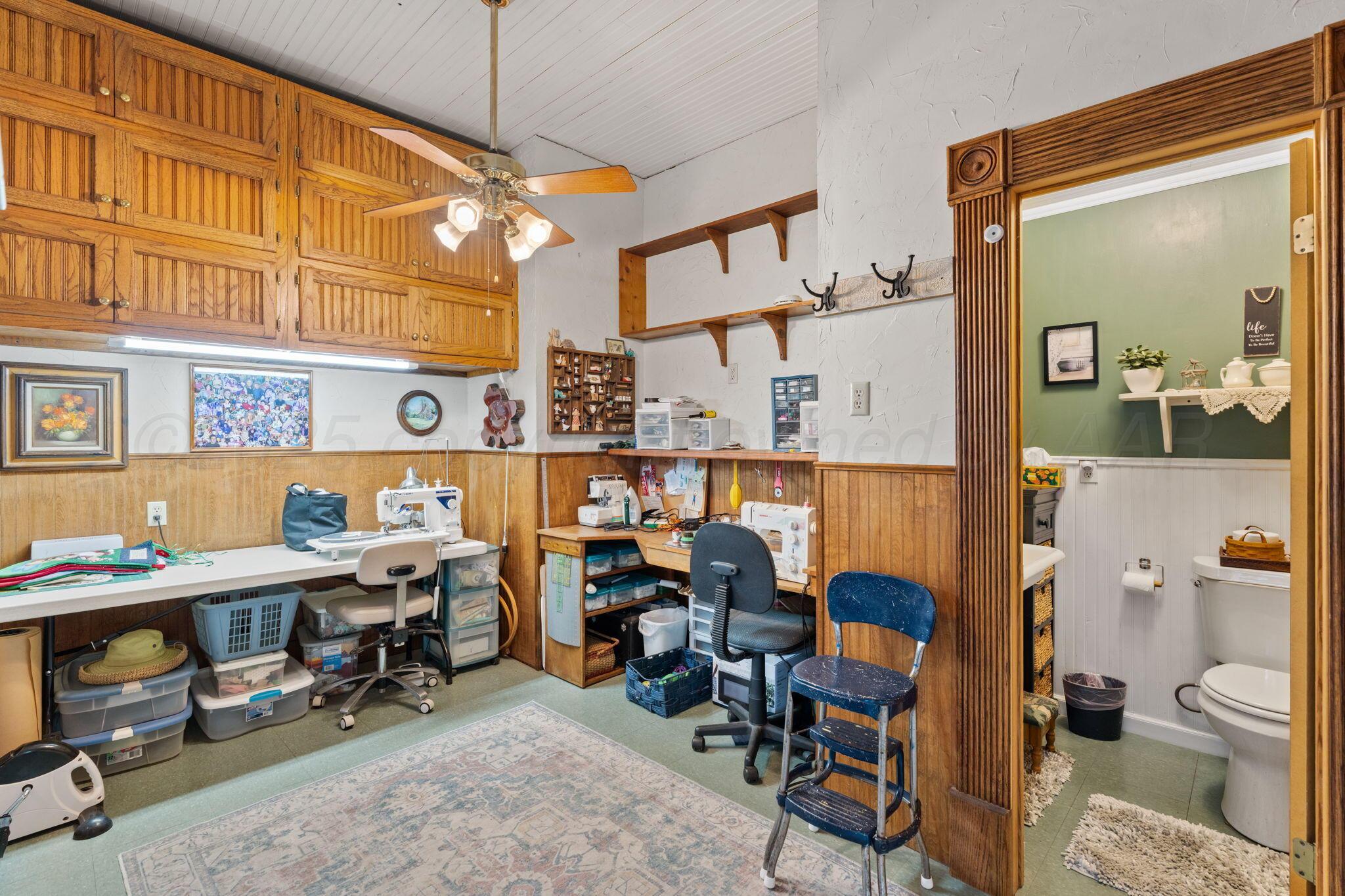 2403 Maple Lane Kingsland, TX 78639 - Photo 20 of 46 a view of a workspace with furniture and a workspace