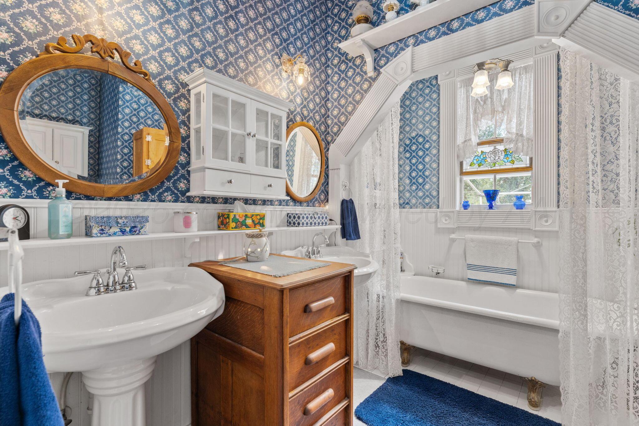 2403 Maple Lane Kingsland, TX 78639 - Photo 25 of 46 a bathroom with a sink and a mirror