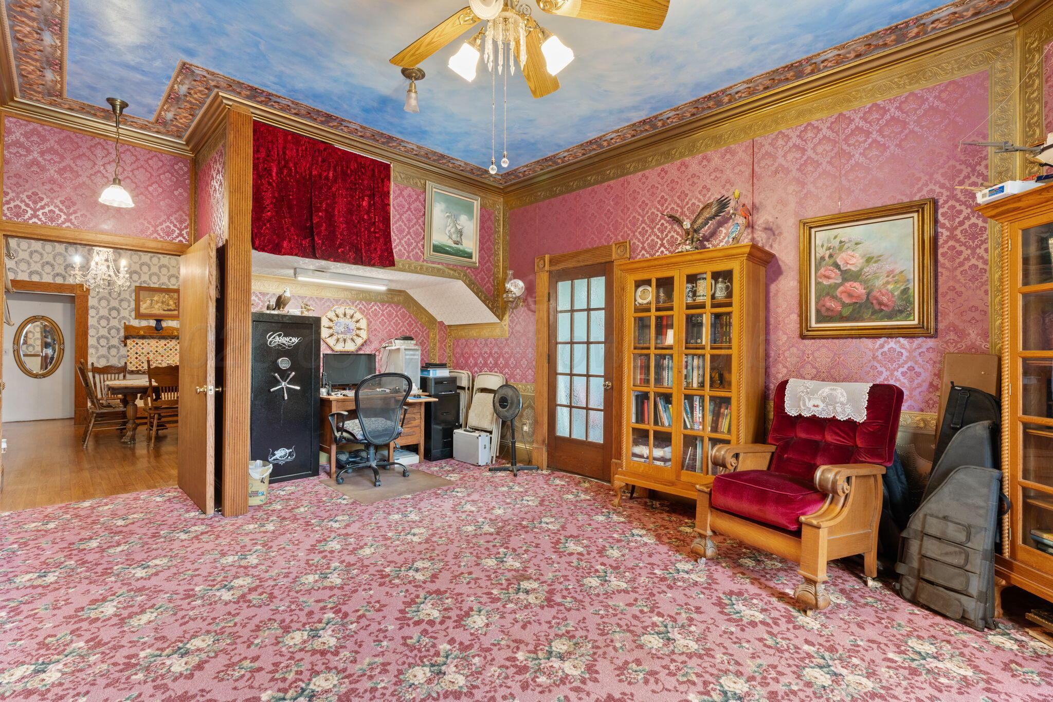 2403 Maple Lane Kingsland, TX 78639 - Photo 27 of 46 a living room with furniture a rug and a chandelier