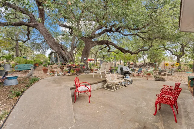 a backyard of a house with seating space
