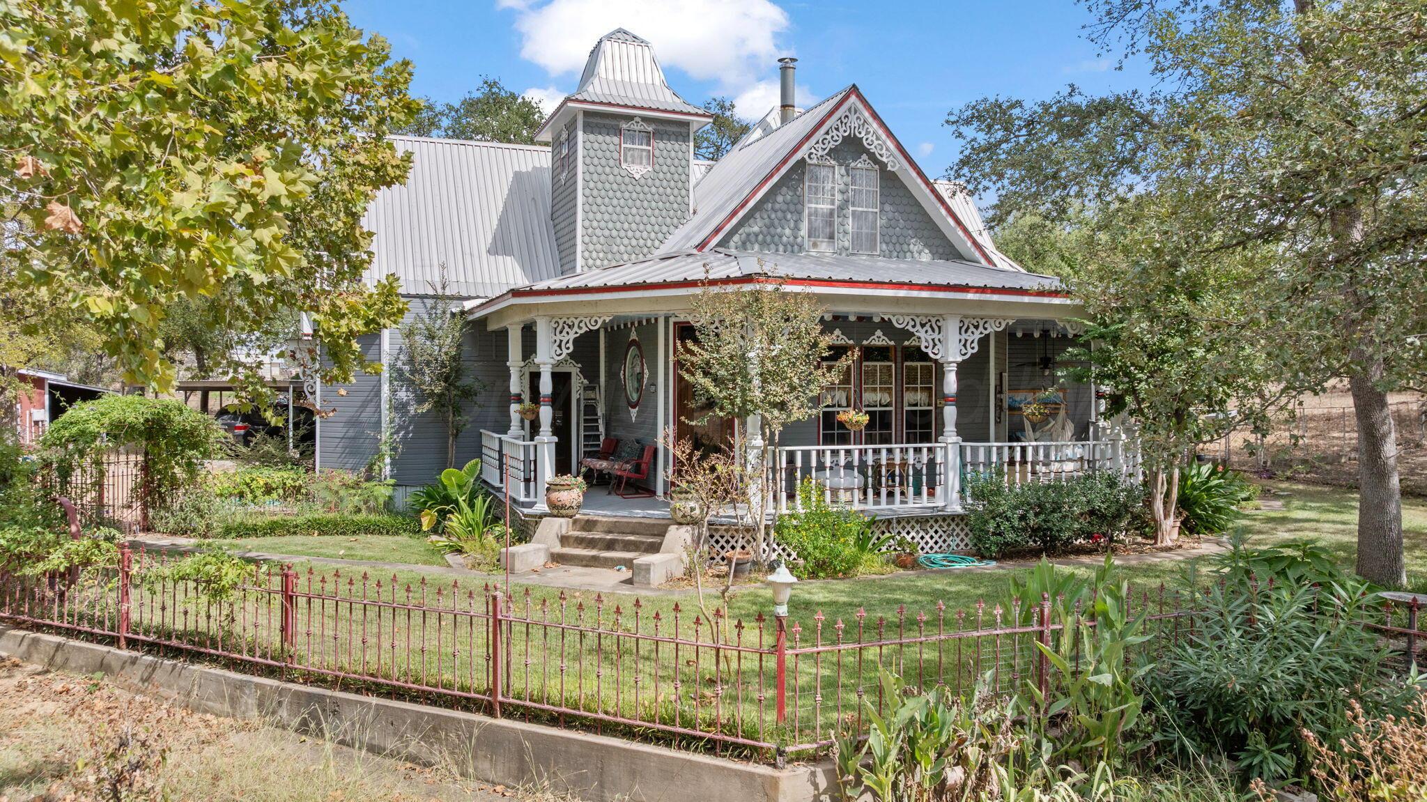 2403 Maple Lane Kingsland, TX 78639 - Photo 45 of 46 front view of a house with a yard