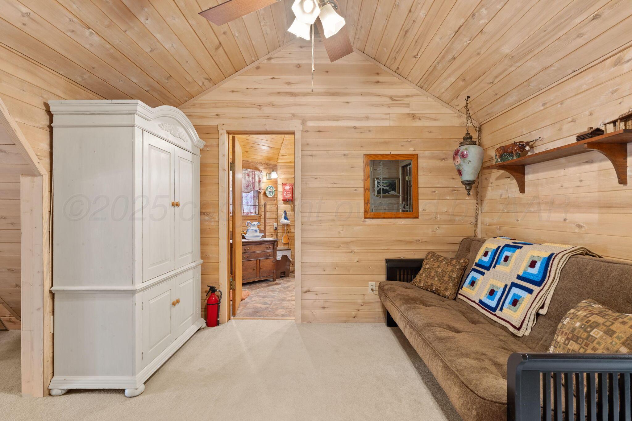 2403 Maple Lane Kingsland, TX 78639 - Photo 5 of 46 a living room with furniture and a chandelier